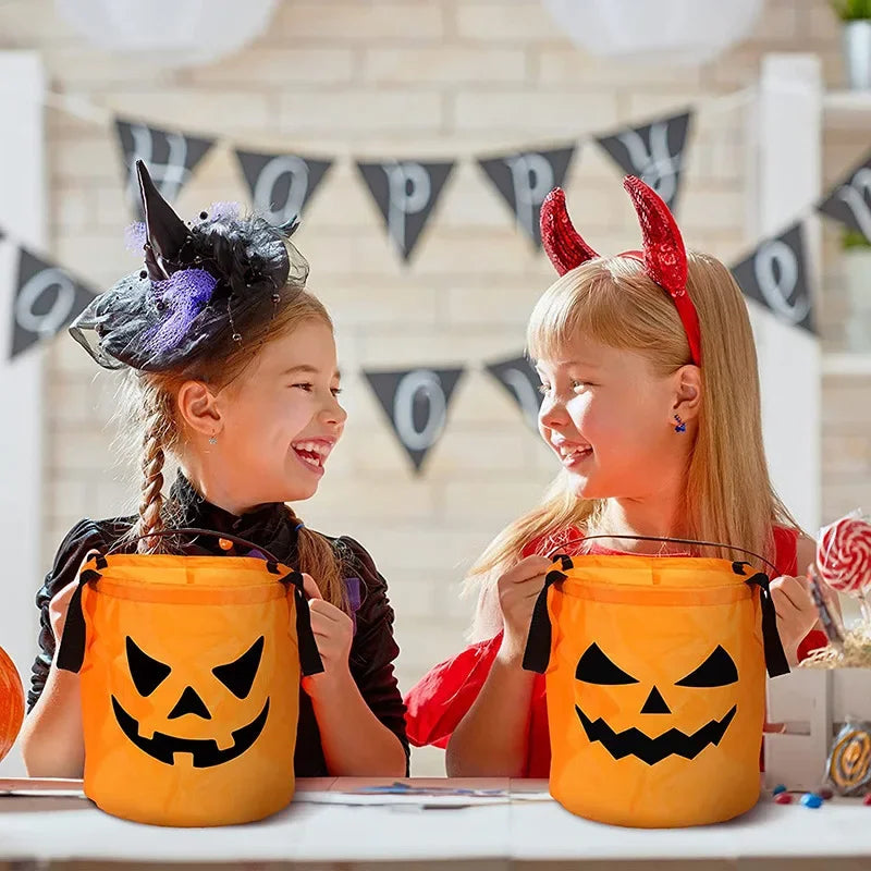 sac lumineux citrouille halloween orange noir motif yeux triangles LED enfants festif