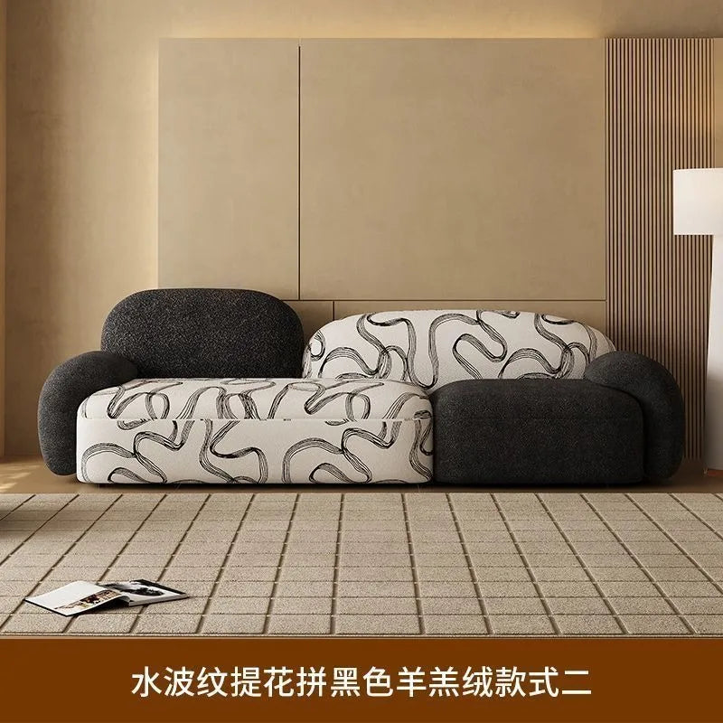 canapé moderne noir blanc fleurs motifs abstraits coussins plateau bois minimaliste italien scandinave