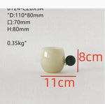 ensemble vaisselle céramique vert clair tasses bol carafe couvercle plateau fruits bougie fleur artificielle