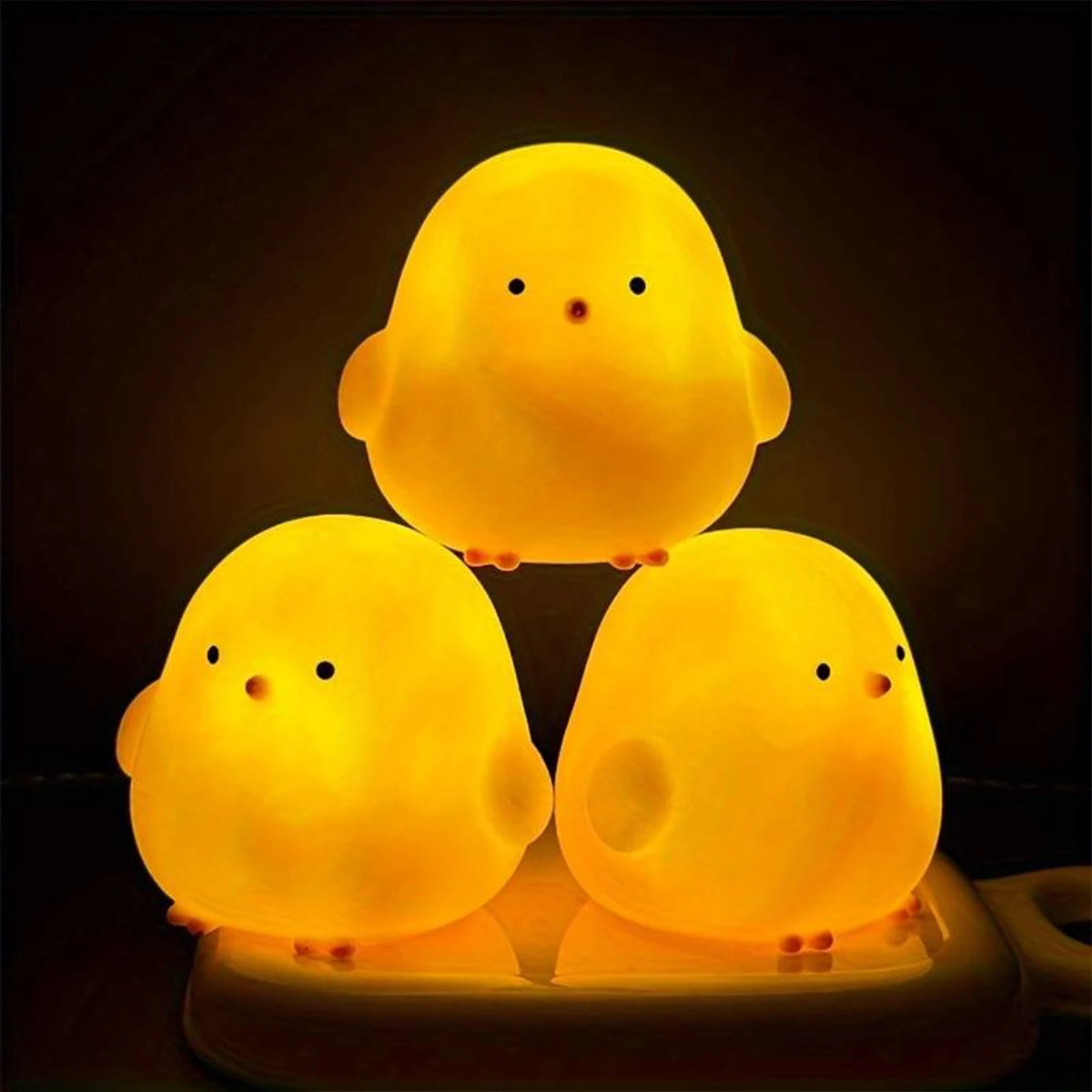 lampe nuit poussin jaune yeux noirs bec orange enfant mignon doux lumière pile bouton
