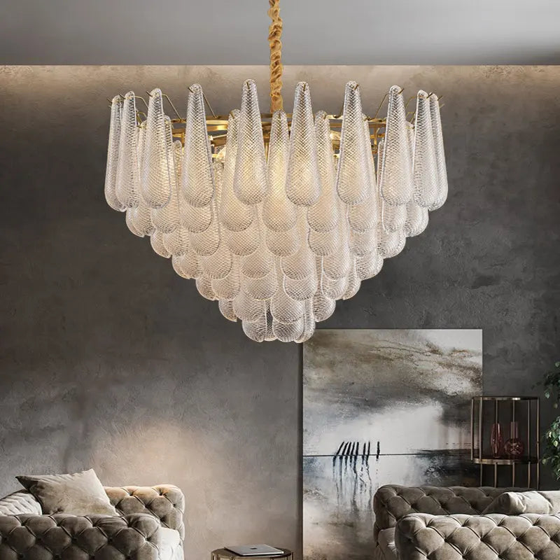 lustre moderne doré transparent géométrique chaîne cuivre flux lumineux salon restaurant