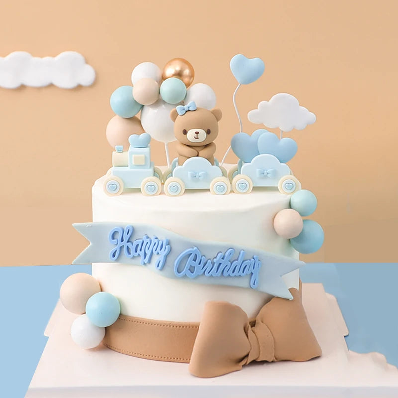 décoration gâteau anniversaire ours bleu rose voiture dessin animé nuages coeurs enfant festive résine