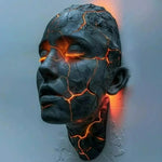 masque sculptural noir orange texture craquelée effet lave art contemporain sans fixation visible