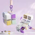cube rangement médicaments violet blanc vert jaune moderne compartiments cordelette portable organisation