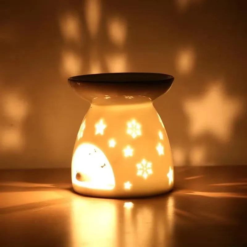 lampe huile essentielle céramique moderne noir blanc décoration feuilles étoiles ajourée diffuseur aromathérapie yoga