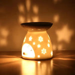 lampe huile essentielle céramique moderne noir blanc décoration feuilles étoiles ajourée diffuseur aromathérapie yoga
