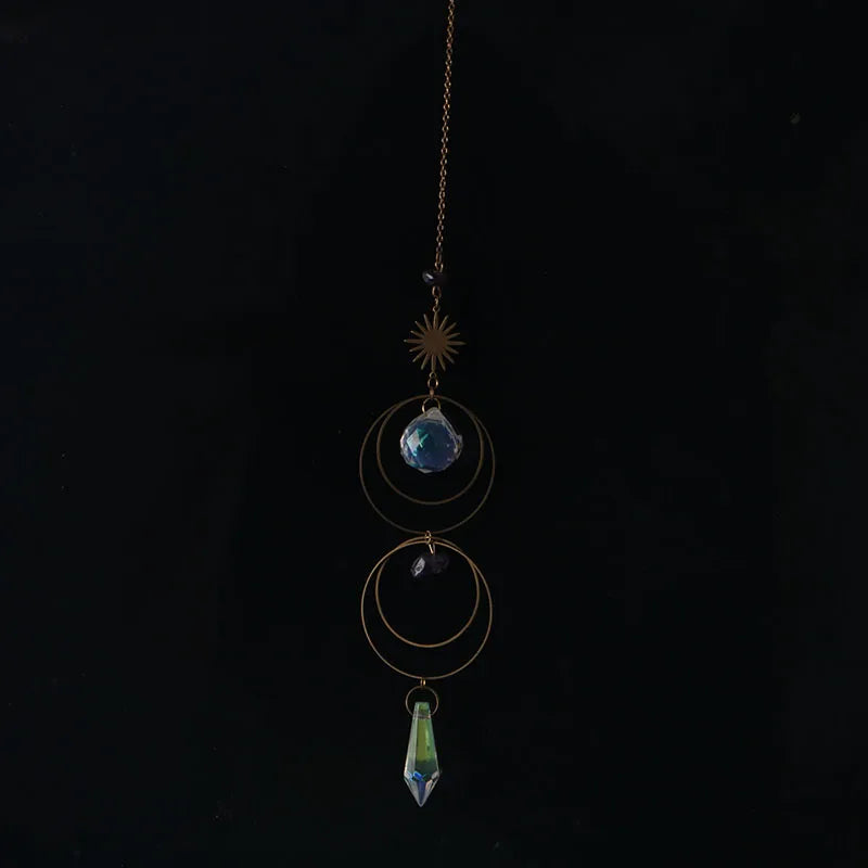 bijou pendentif cristal or bleu violet vert formes géométriques motifs oculaires translucides boho chic