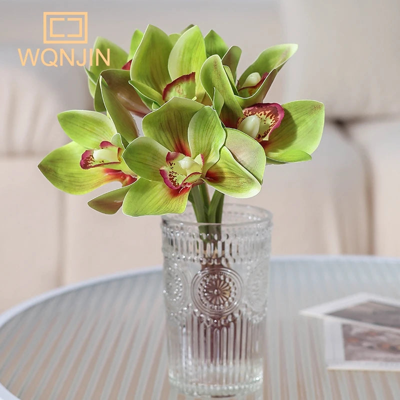 bouquet orchidées artificielles vert rouge orange rose jaune décoration mariage intérieur moderne minimaliste