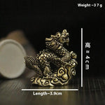 statue dragon dorée détails sculpturaux artisanal feng shui décoration intérieure ornement fine
