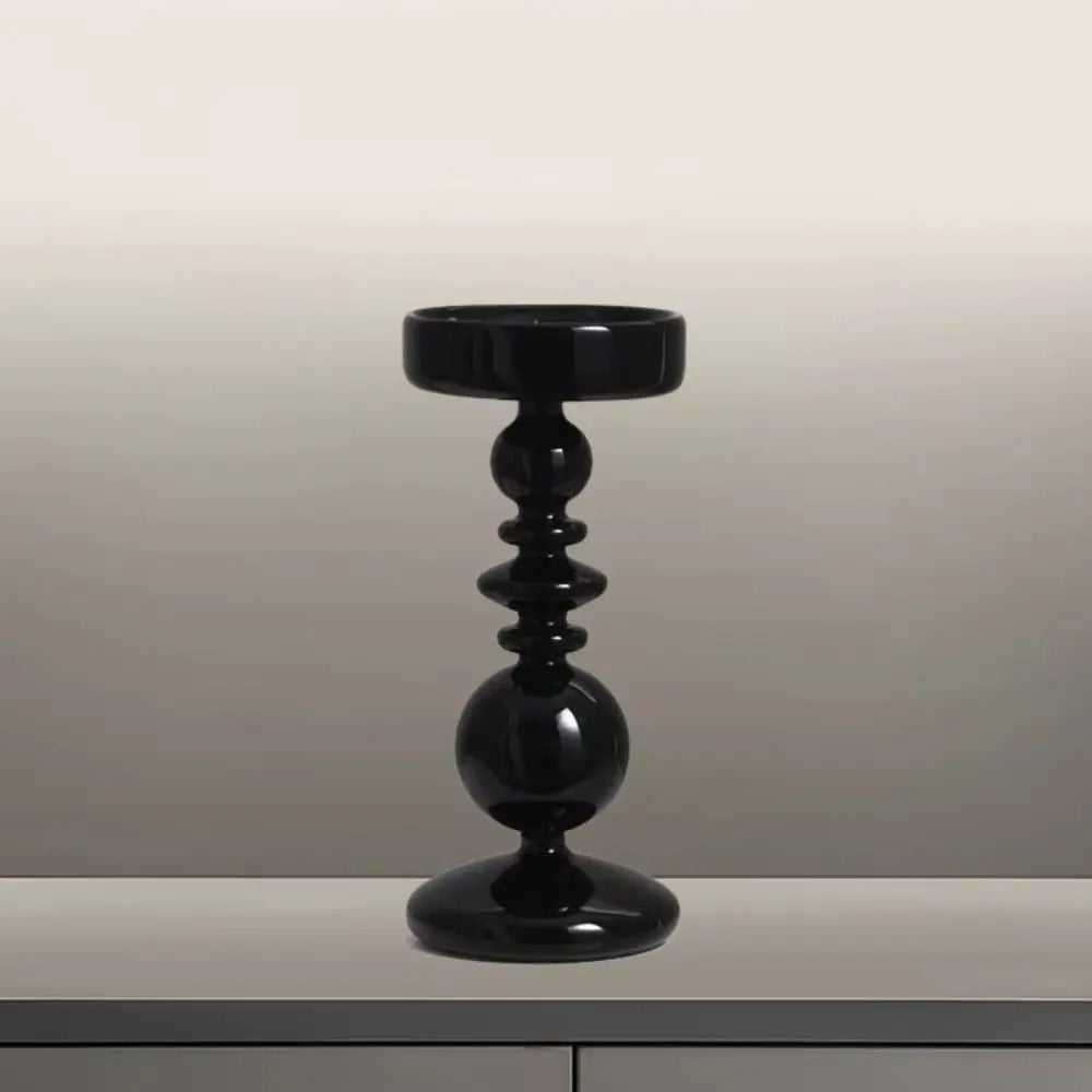 bougeoirs moderne élégants noir argenté sphériques table decoration lumière romantique festive minimaliste