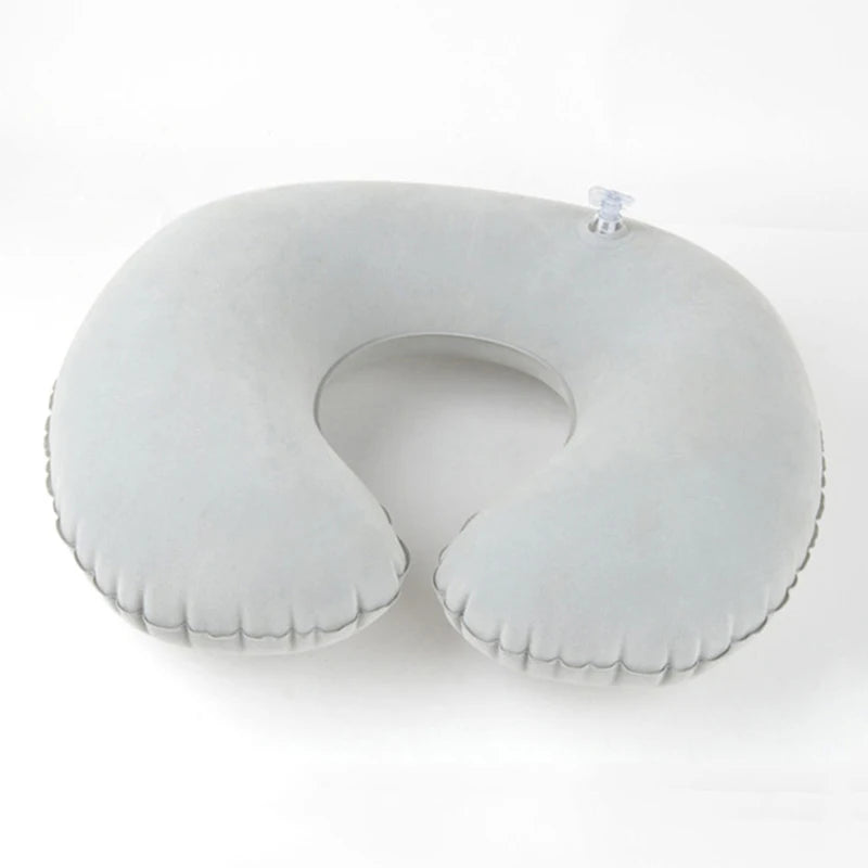 coussin voyage gonflable forme cou confortable velours gris rose bleu ergonomique portable sac rangement