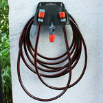 support mural tuyau arrosage rangement jardin noir orange fonctionnel fixations trou vis plastique