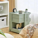 support stockage rotatif multifonction moderne plastique blanc orange vert minimaliste roulettes portatif