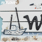panneau décoratif marin bateau maison phare coquillages blanc bleu noir