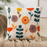 coussins carrés brodés motifs floraux modernes toile blanc jaune vert rouge bleu opaques