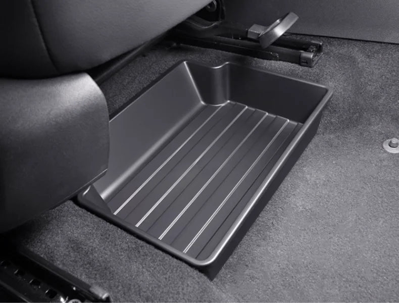 rangement sous siège voiture moderne boite adhésive noir lisse opaque léger lumière