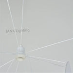 suspension lumineuse moderne blanc formes organiques ampoules câbles suspendus flux lumineux 2000 82000 certification