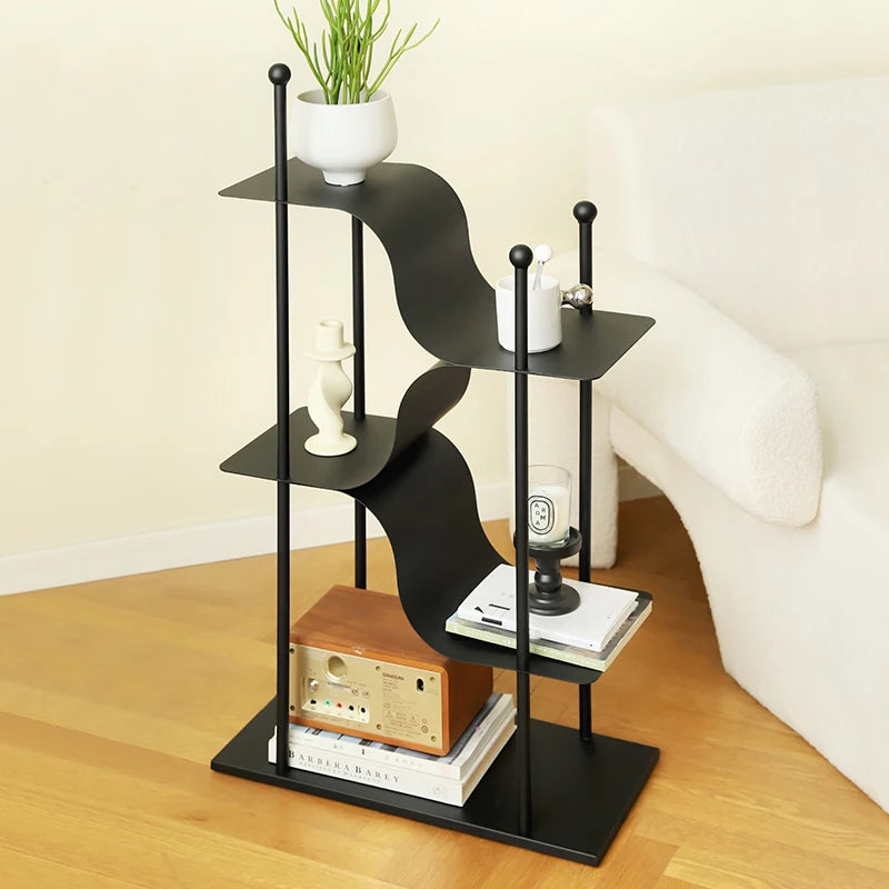 étagère mobile moderne noire courbes fluides contemporaine roulettes plantes objets décoration minimaliste