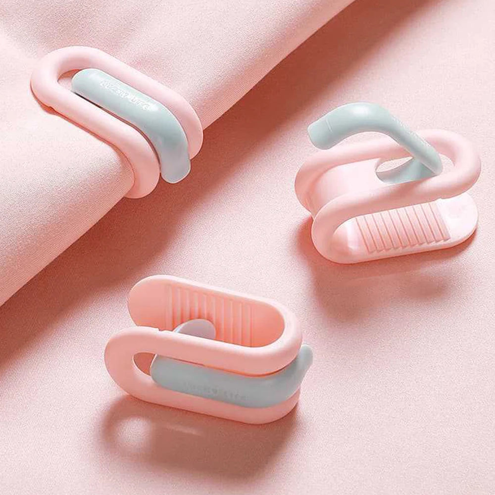 clips rangement moderne rose clair beige vert pastel violet adhésifs minimalistes pièces invisible housse