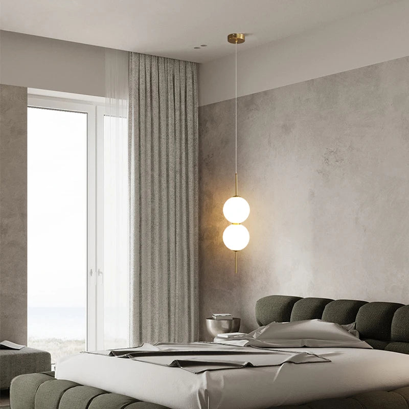 suspension lumineuse moderne blanc doré sphères translucides câble suspendu minimaliste trois leds chambre salon