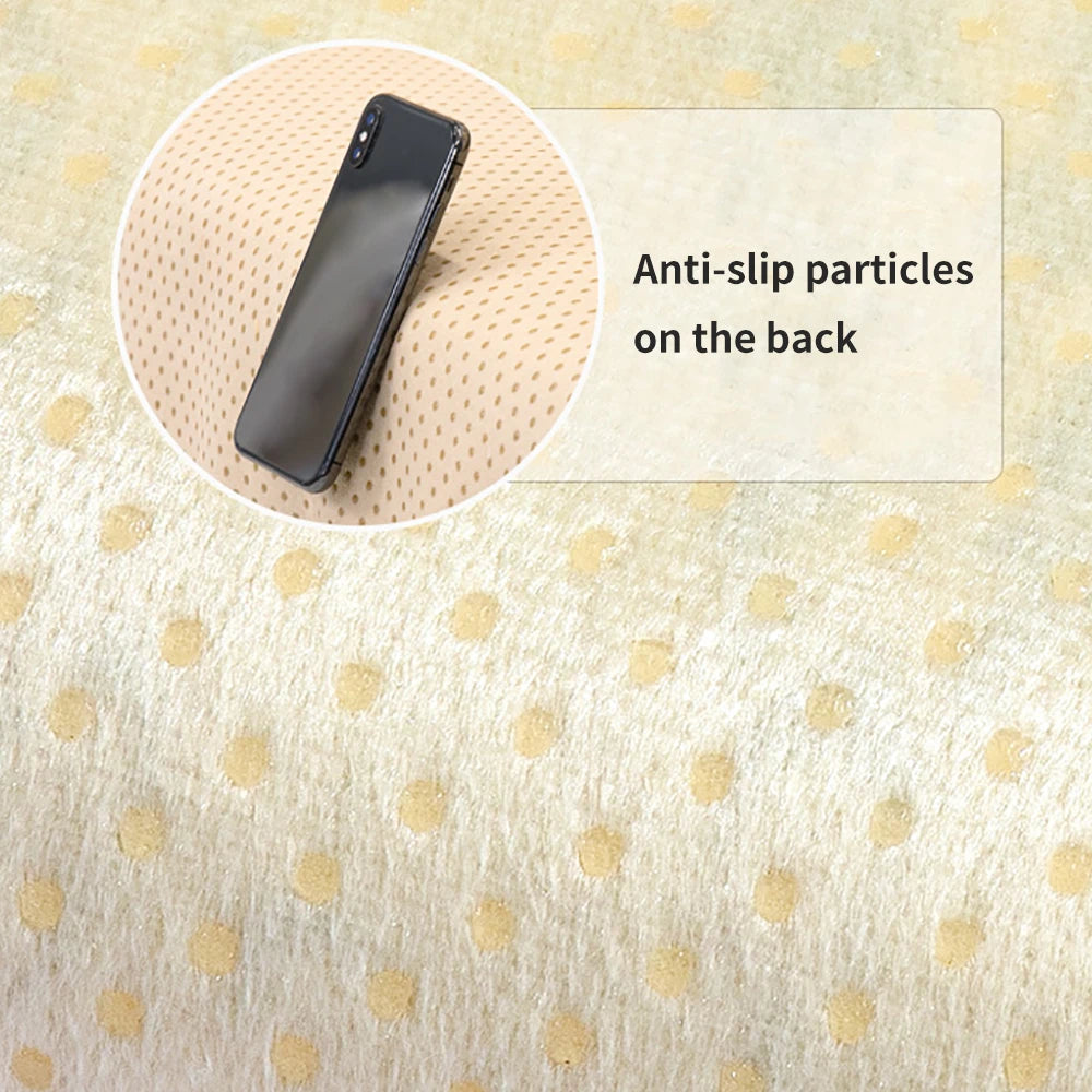 Appareil mobile posé sur un matériau perforé avec des particules antidérapantes à l'arrière.