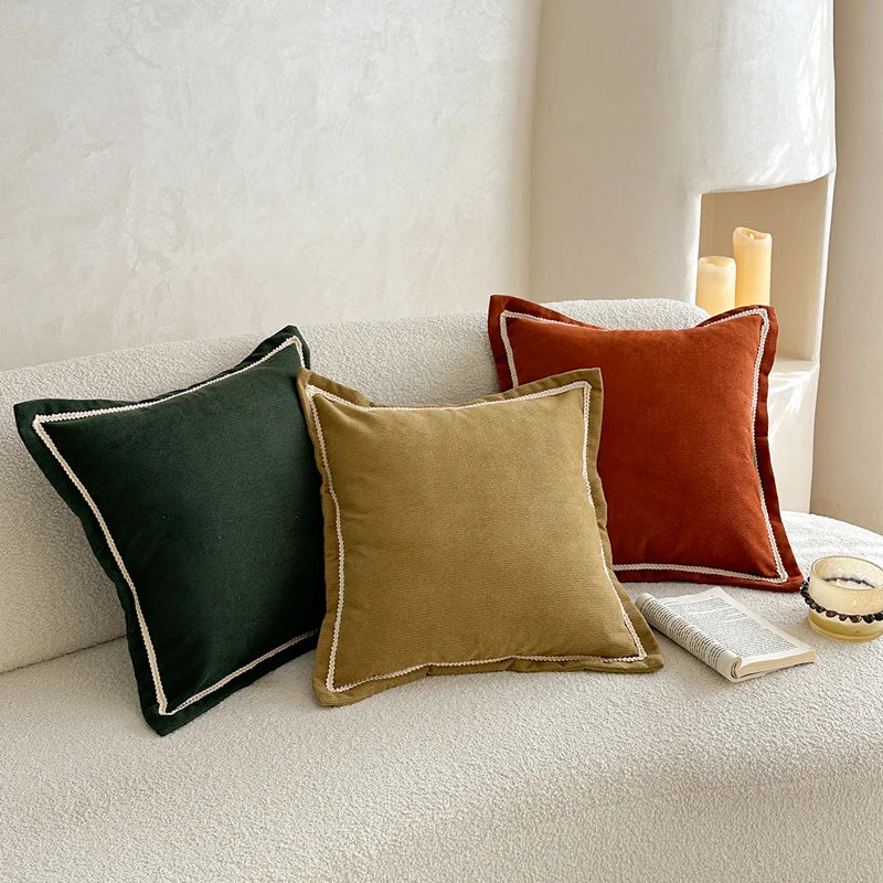 housse coussin décoratif carré couleur marron doré orange texture veloutée bord festonné scandinave minimaliste