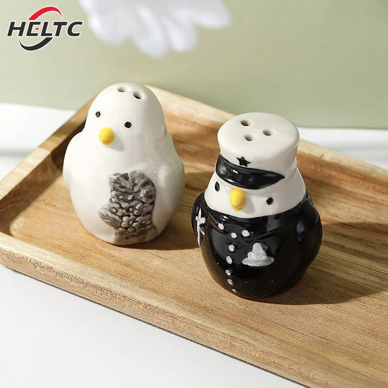 pots épices forme pingouins blanc noir jaune texture plumes décorative étoiles sapins mignon animalier