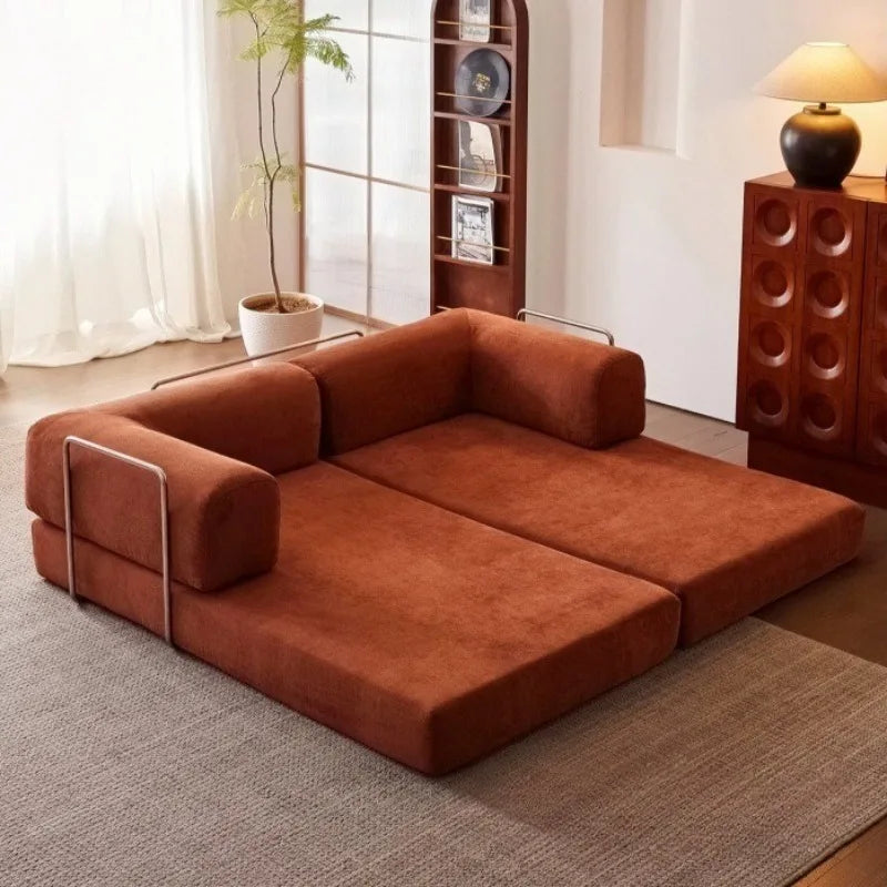 canapé sectionnel moderne velours marron coussins minimaliste métal opaque salon