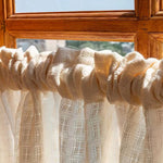 rideau blanc cassé bohème franges pompons tissage texturé motif carré translucide décoration intérieure