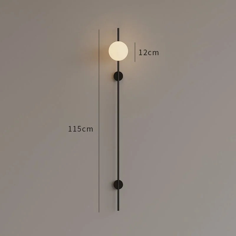 appliques murales contemporaines led sphères blanches finition métallique doré noir minimaliste