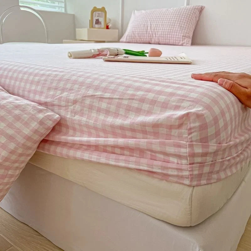 protège matelas carreaux bleu clair gris clair rose clair jaune clair vert clair classique