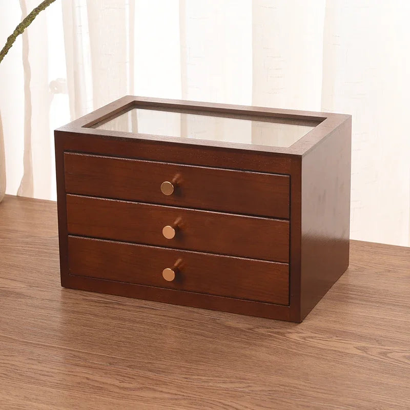 boîte bijoux marron foncé verre transparent poignées dorées classique envelloppe présente bijoux faux daim