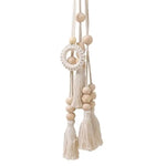 rideau polonais moderne beige uni bois pompons coton accessoires cotonnants