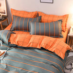 Détail du motif géométrique rayé réversible gris et orange