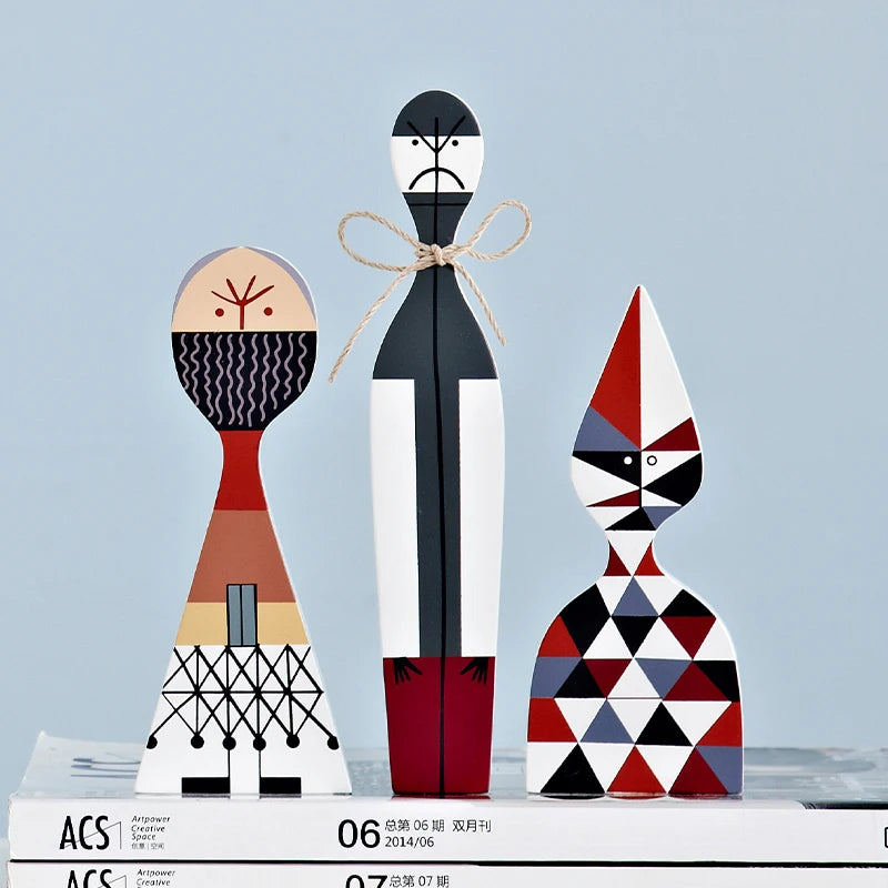 figurines decoratives modernes abstraites geometriques blanc noir rouge bleu gris beige triangles lignes noel