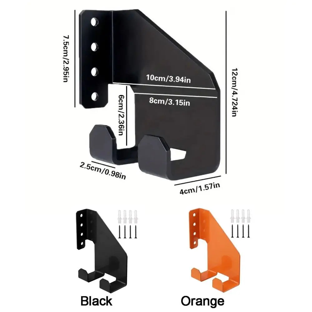 support mural industriel noir orange outils jardin vis cheville fixations robustes tronçonneuse pelles multifonctionnels