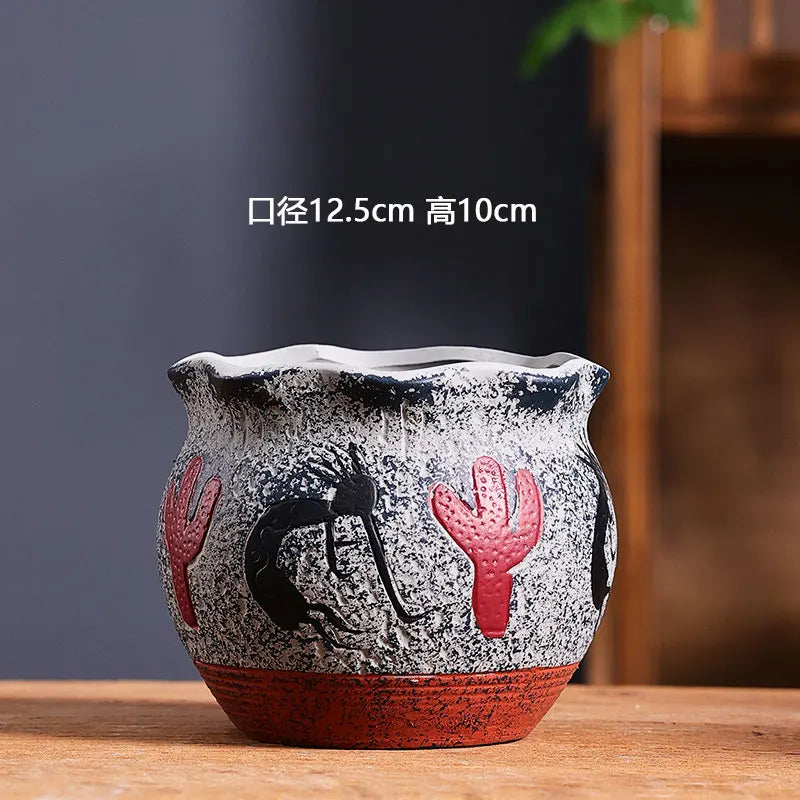 cache pot céramique artisanal méditerranéen couleurs vives motifs texturés plante verte intérieur moderne