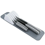 tapis cuisine moderne gris clair blanc points texturés rangement couverts couteaux antidérapants emplacements tiroirs