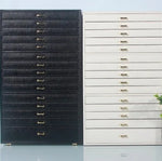 coffret bijoux moderne simili cuir noir blanc vert compartiments poignées dorées stockage sécurité