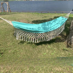 hamac vert turquoise tissu uni franges bohème fixations bois sac rangement