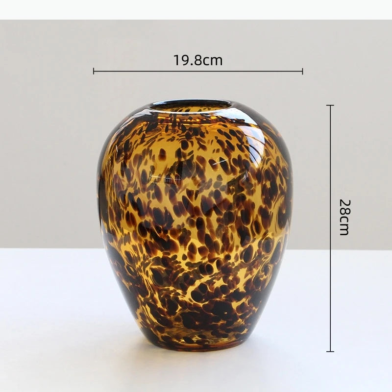 vase moderne imprimé léopard marron noir décoration intérieure arrangement floral pot fleurs terrarium table