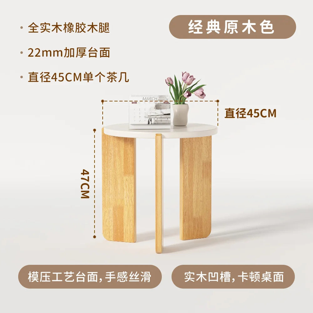 table basse moderne minimaliste bois blanc plateau lisse pieds naturels magazine vase fruits panier