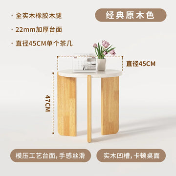 table basse moderne minimaliste bois blanc plateau lisse pieds naturels magazine vase fruits panier
