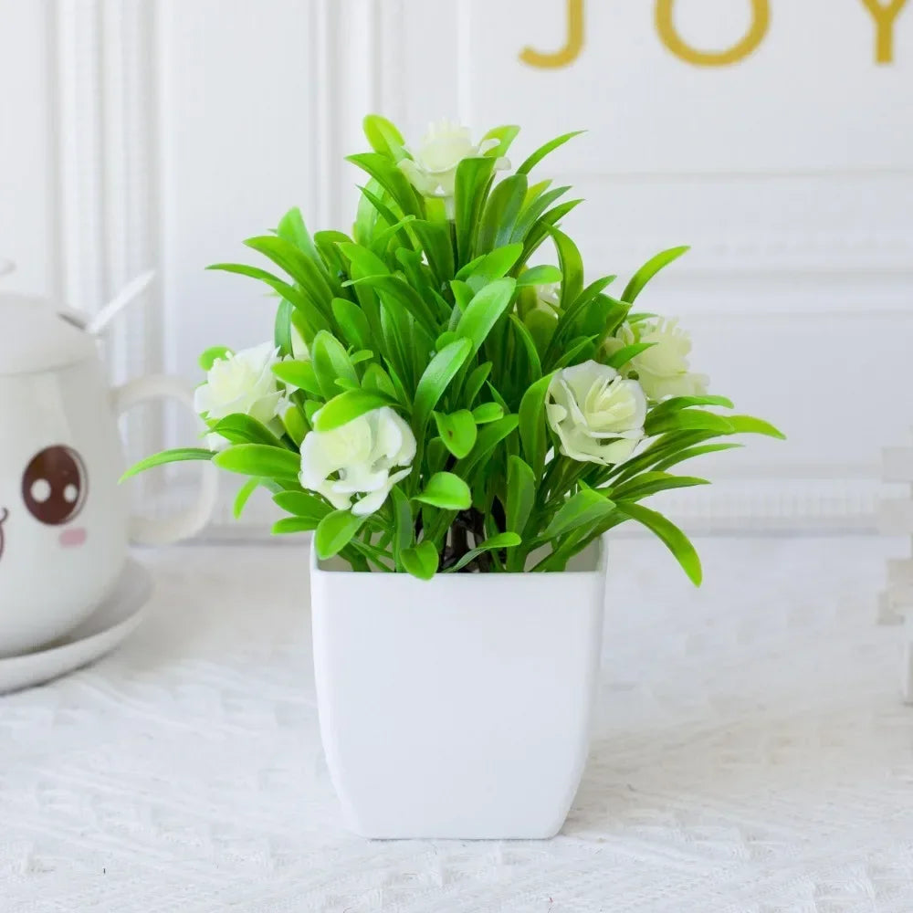 décoration extérieure plante artificielle moderne pot carré blanc branches feuilles vertes fleurs violettes minimalisteextérieur