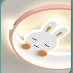 lampe moderne enfantine dessin animé lapin rose blanc yeux fermés oreilles pointues