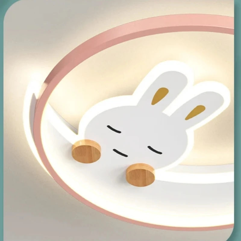 lampe moderne enfantine dessin animé lapin rose blanc yeux fermés oreilles pointues