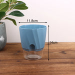 pot plantes moderne transparent semi opaque facettes géométriques blanc rose grisSuspension