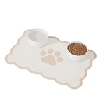 tapis anti dérapant imperméable adhésif blanc beige imprimé pattes chien moderne deux bols