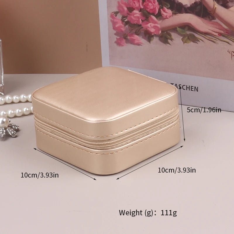 boîte bijoux zippée velours rose pâle moderne élégante femme bracelet boucles doreilles collier montre