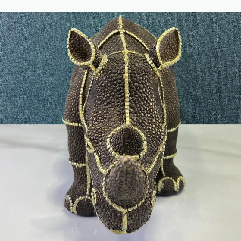 statuette rhinocéros marron foncé texture granuleuse décoratif animalier doré grande petite